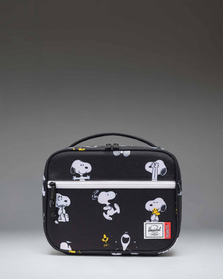 Herschel Supply Co. Peanuts Pop Quiz Lunch Box in Snoopy and Woodstock Black featuring a repeating pattern of Snoopy sleeping on his doghouse.