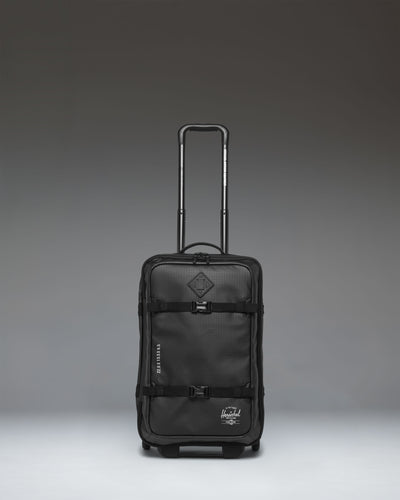 Herschel Supply Co. All Season Hybrid Roller Bag Large Carry On in black, showing the front exterior view of the luggage.