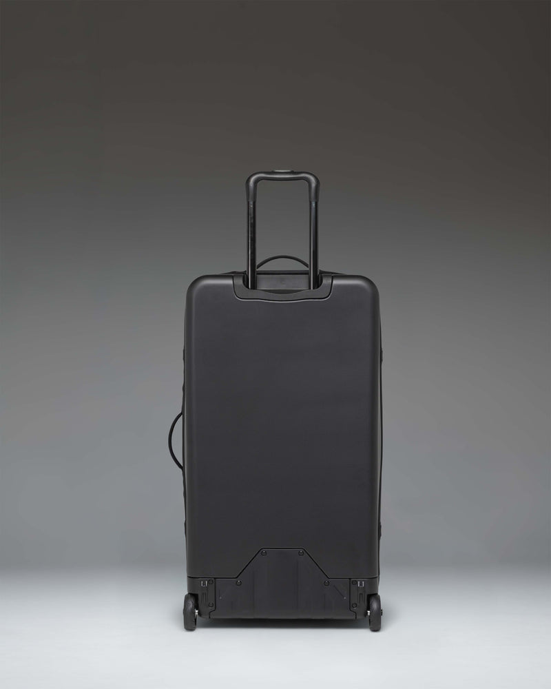 Black Herschel All Season Hybrid Roller Bag Large on a white background.