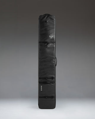 Herschel Supply Co. Snow Roller Bag 168cm in black, shown from a side profile view.