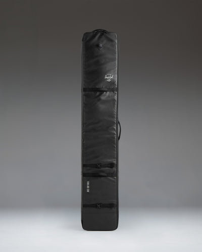 Herschel Supply Co. Snow Roller Bag 168cm in black, shown from a side profile view.