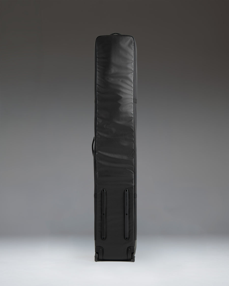 Herschel Supply Co. Snow Roller Bag 168cm in black, showing the interior compartments and storage space for snow gear.