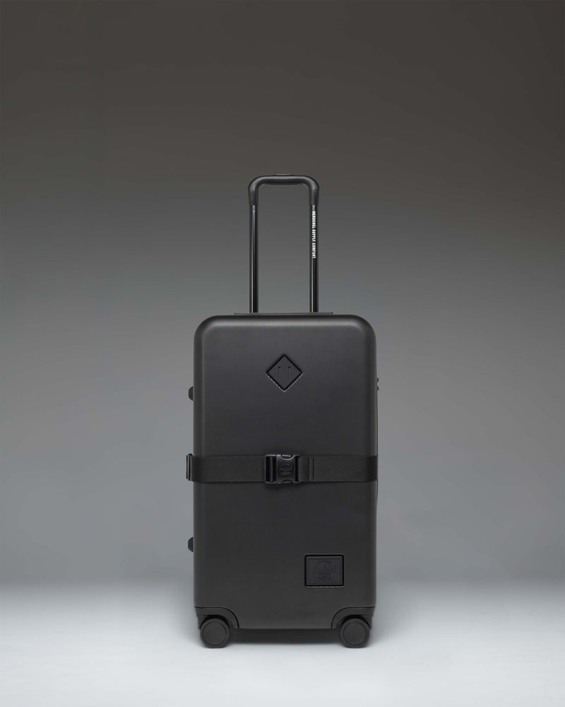 Herschel Supply Co. Heritage Hardshell Medium Luggage Exp in black.