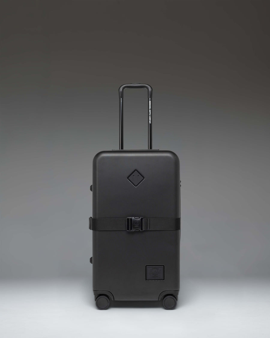 Herschel Supply Co. Heritage Hardshell Medium Luggage Exp in black.
