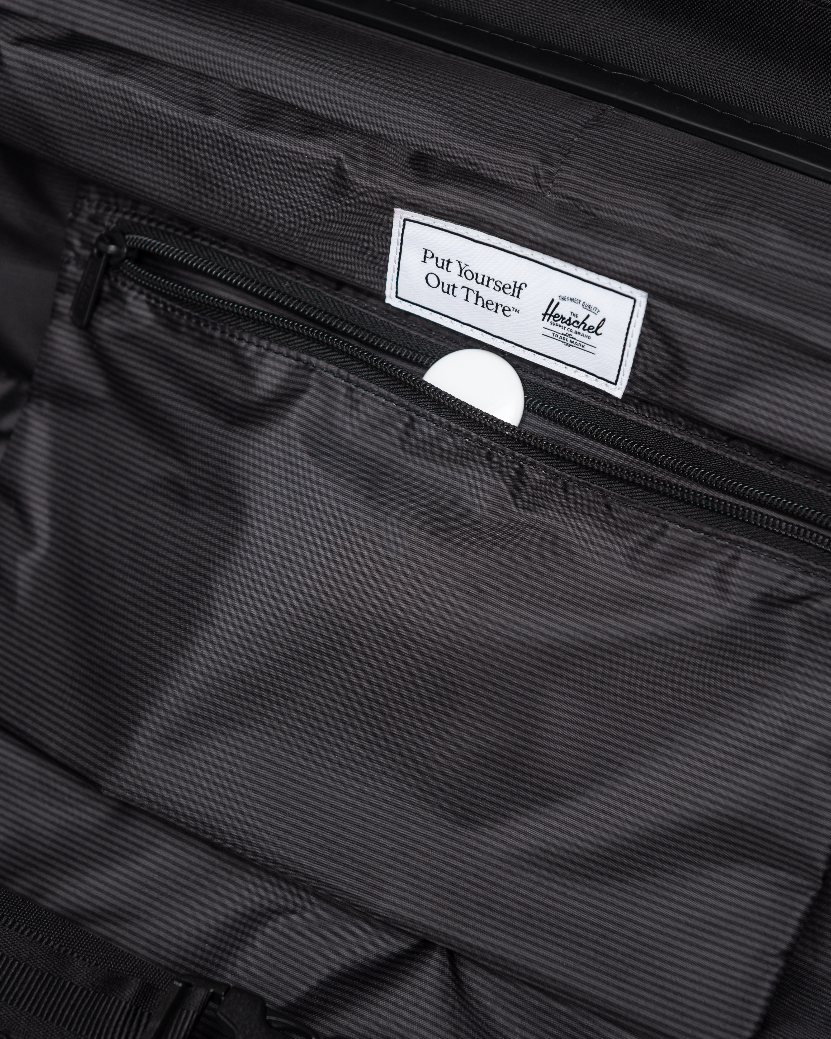 Herschel Heritage Hardshell Large Luggage Exp highlighted to showcase its durable expansion feature and sleek travel design.