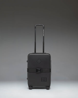 Black Herschel Heritage Hardshell Large Carry On Exp suitcase in Black, front view.