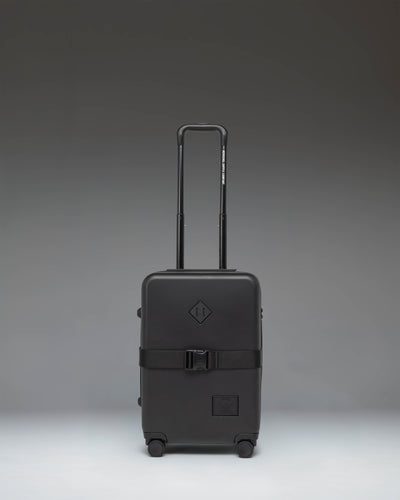 Black Herschel Heritage Hardshell Large Carry On Exp suitcase in Black, front view.