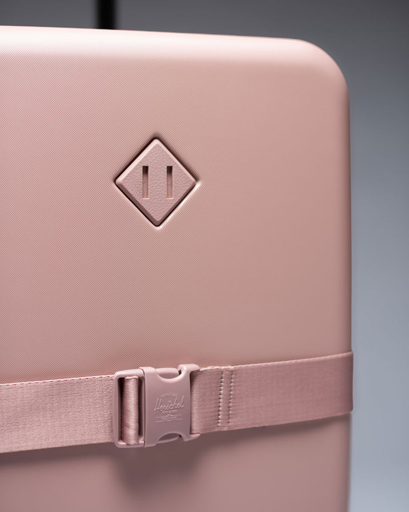 Herschel Heritage Hardshell Large Carry On Expandable luggage displayed in a variety of available colors.