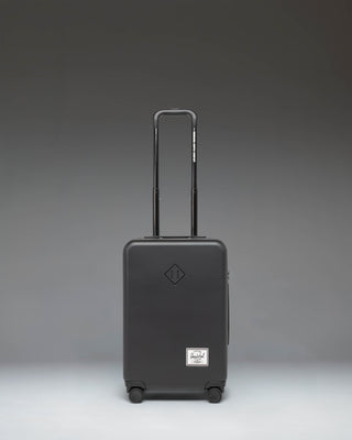 Black Herschel Heritage Hardshell Large Carry-On Luggage.