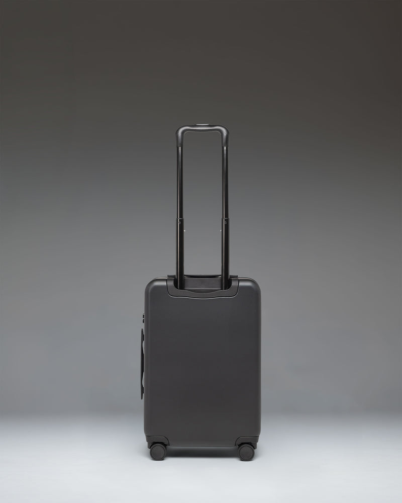 Black Herschel Heritage Hardshell Large Carry-On Luggage suitcase, alternate view.
