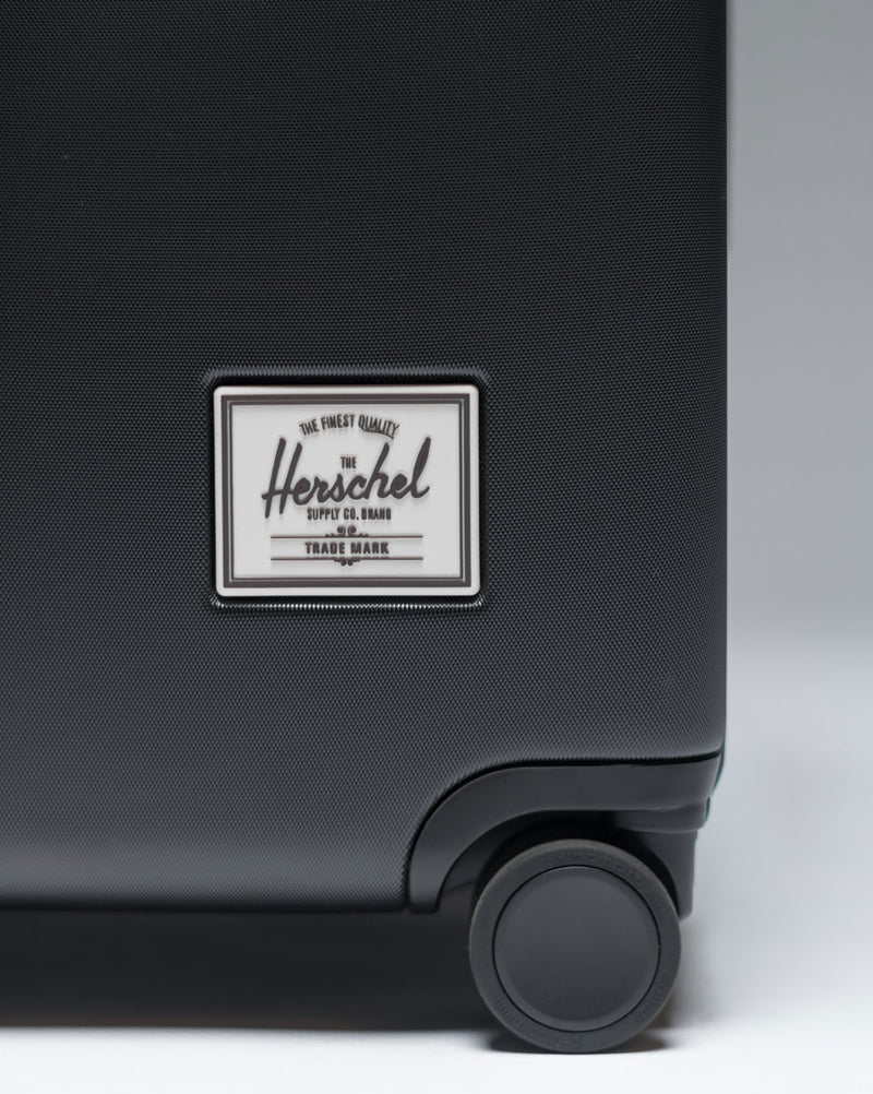 Color options grid for Herschel Heritage Hardshell Large Carry-On Luggage, showcasing all available colors.