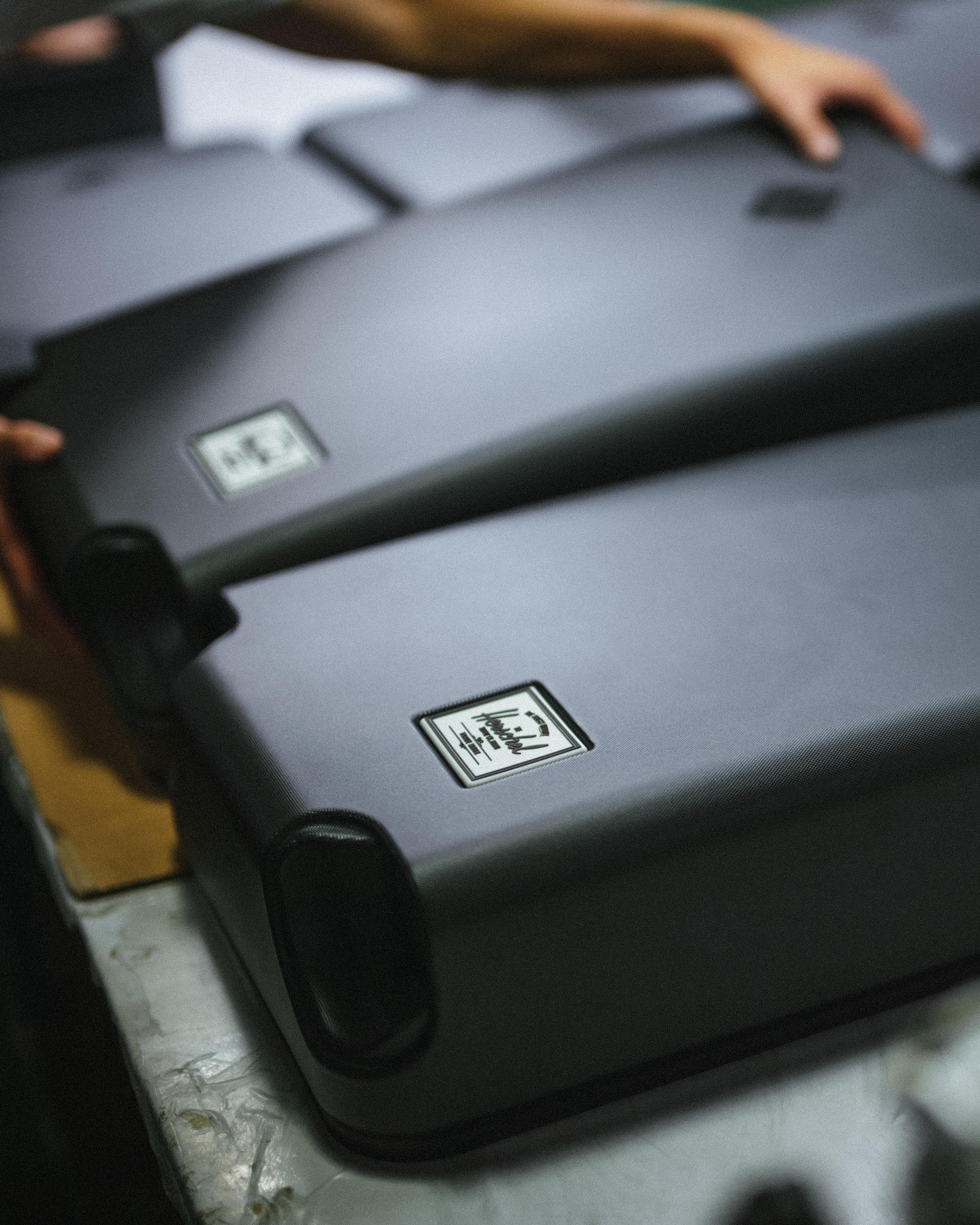 Size guide chart for Herschel Heritage Hardshell Luggage showing dimensions for Carry On, Large Carry On, Medium, and Large sizes.