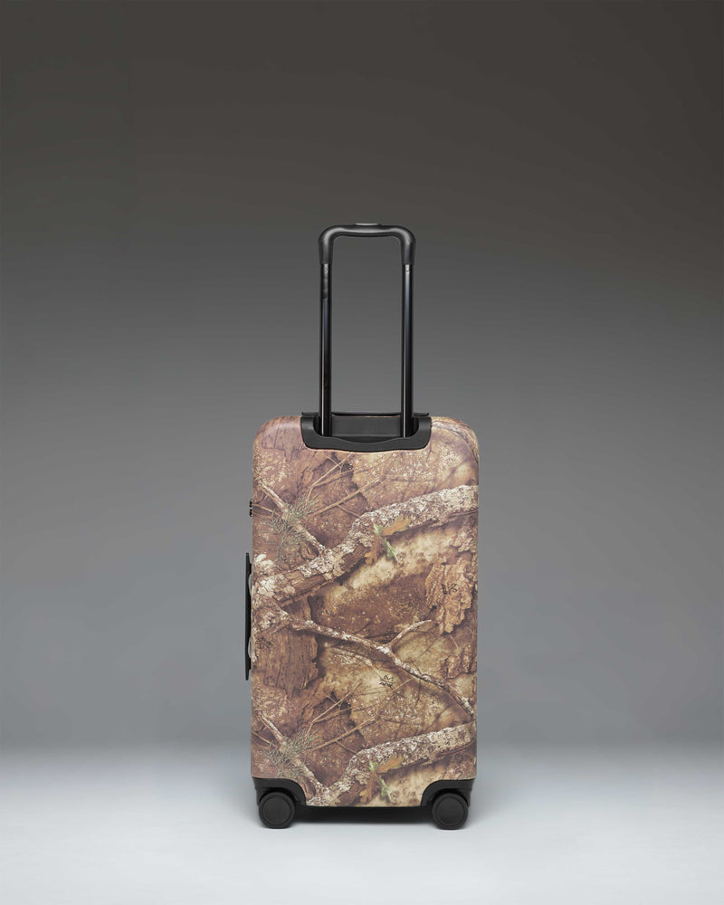 Herschel Supply Co. Heritage Medium Luggage in Realtree APX Camo pattern.