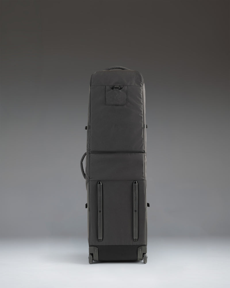 Black Herschel Heritage Golf Travel Wheelie Bag in black, showing a detailed view of the durable exterior and wheels.