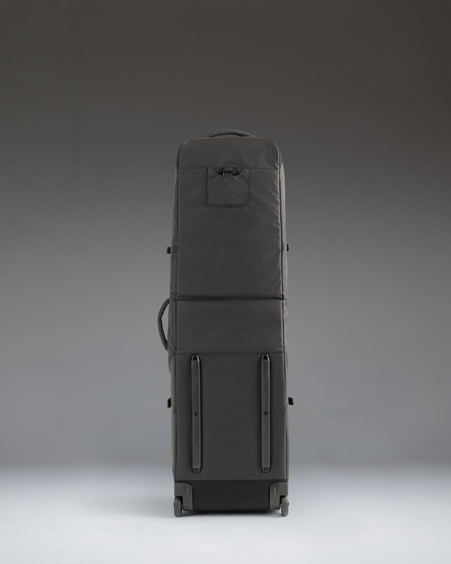 Black Herschel Heritage Golf Travel Wheelie Bag in black, showing a detailed view of the durable exterior and wheels.