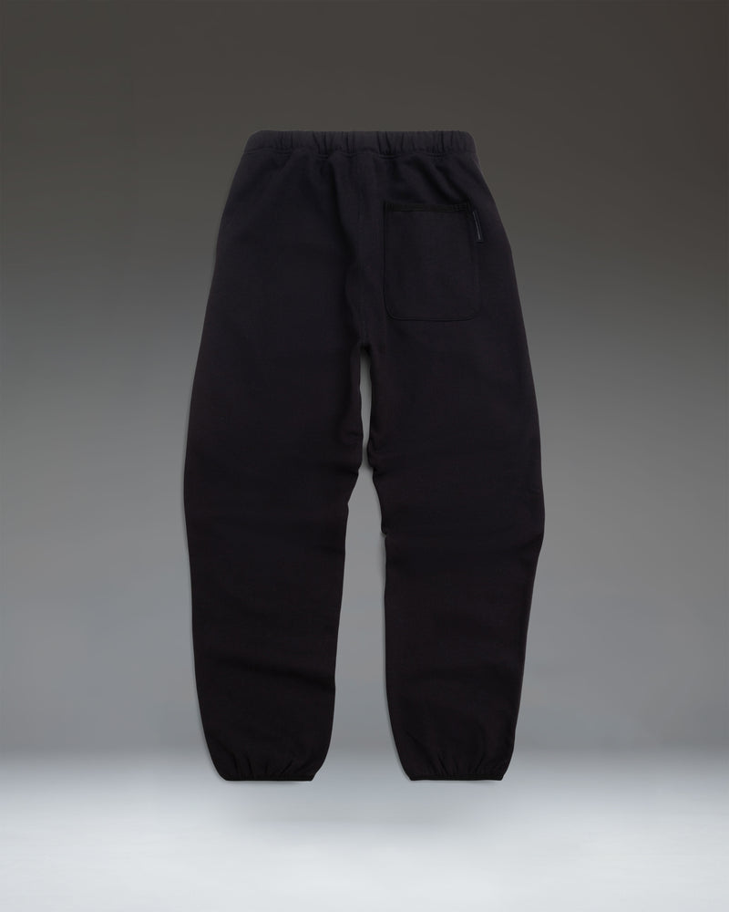 Women's performance sweatpants size guide chart in black. Waist: XS 24-25, S 26-27, M 28-29, L 30-32, XL 33-35. Inseam: 28 inches for all sizes.