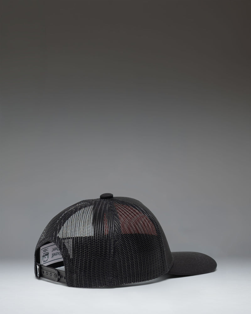 Herschel Supply Co. Whaler Cotton Mesh Baby Cap in Black for ages 6-18 months, showing a detailed view of the product.