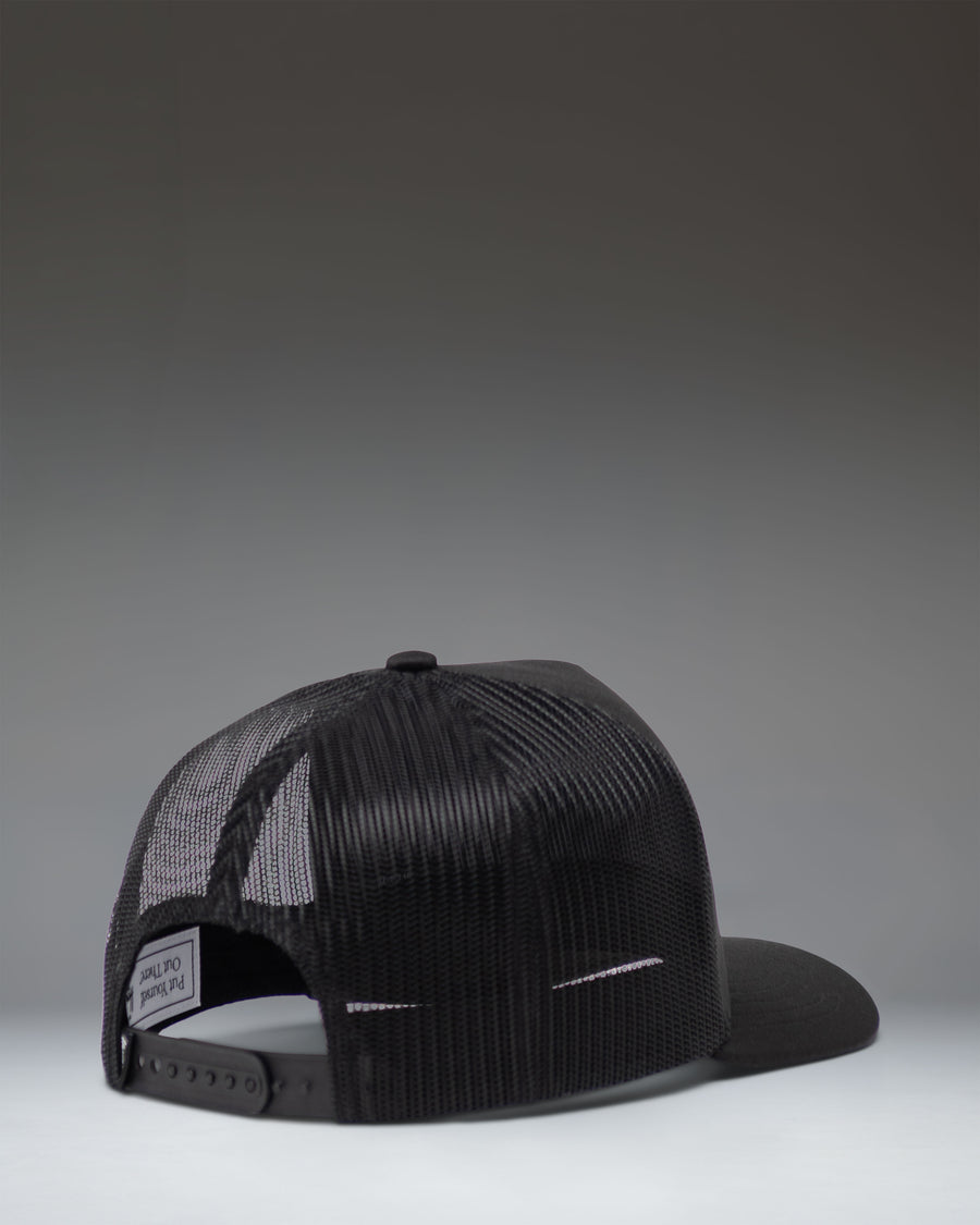 Black Herschel Supply Co. Whaler Tall Mesh Cap, side view showing the breathable mesh back panels and adjustable snapback closure.