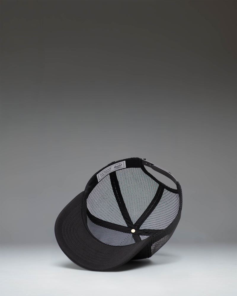 Herschel Supply Co Whaler Tall Mesh Cap in black, featuring a structured high crown, mesh back panels, and an adjustable snapback closure.
