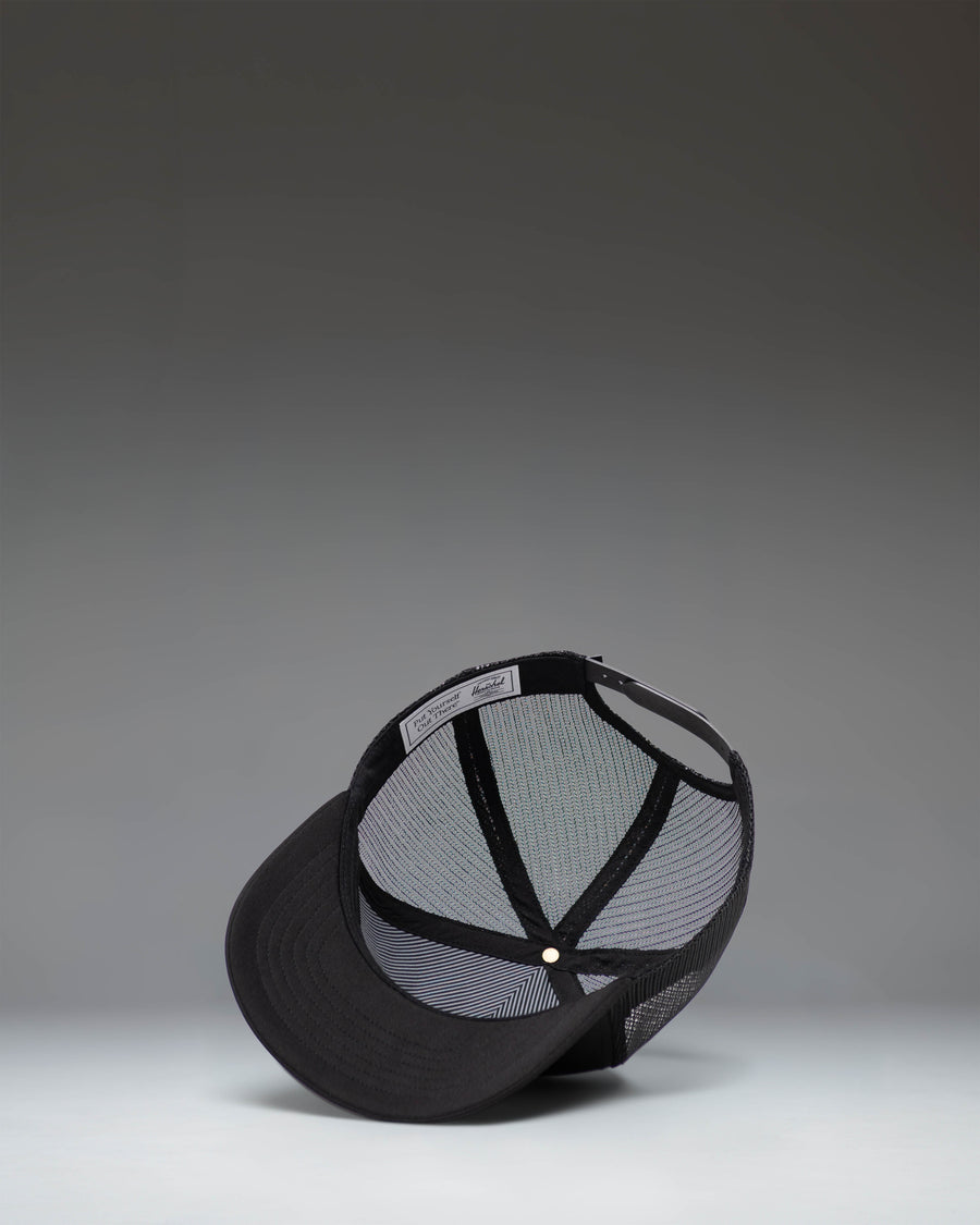 Herschel Supply Co Whaler Tall Mesh Cap in black, featuring a structured high crown, mesh back panels, and an adjustable snapback closure.