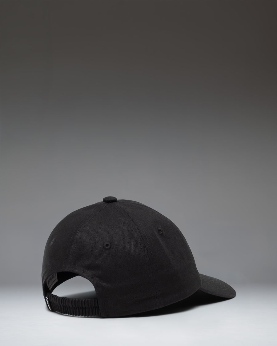 Herschel Supply Co. Sylas Kids Cap in Black, a classic adjustable baseball hat for children.