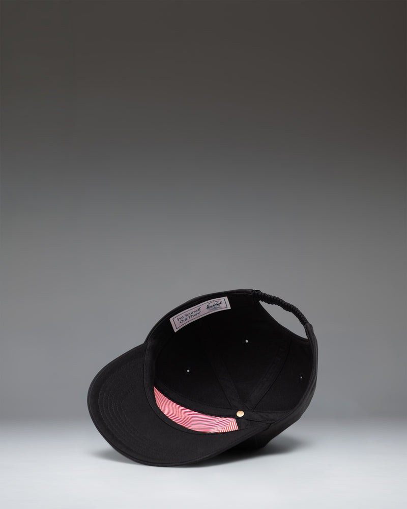 Black Herschel Supply Co. Sylas Kids Cap, a classic adjustable strapback hat for children.