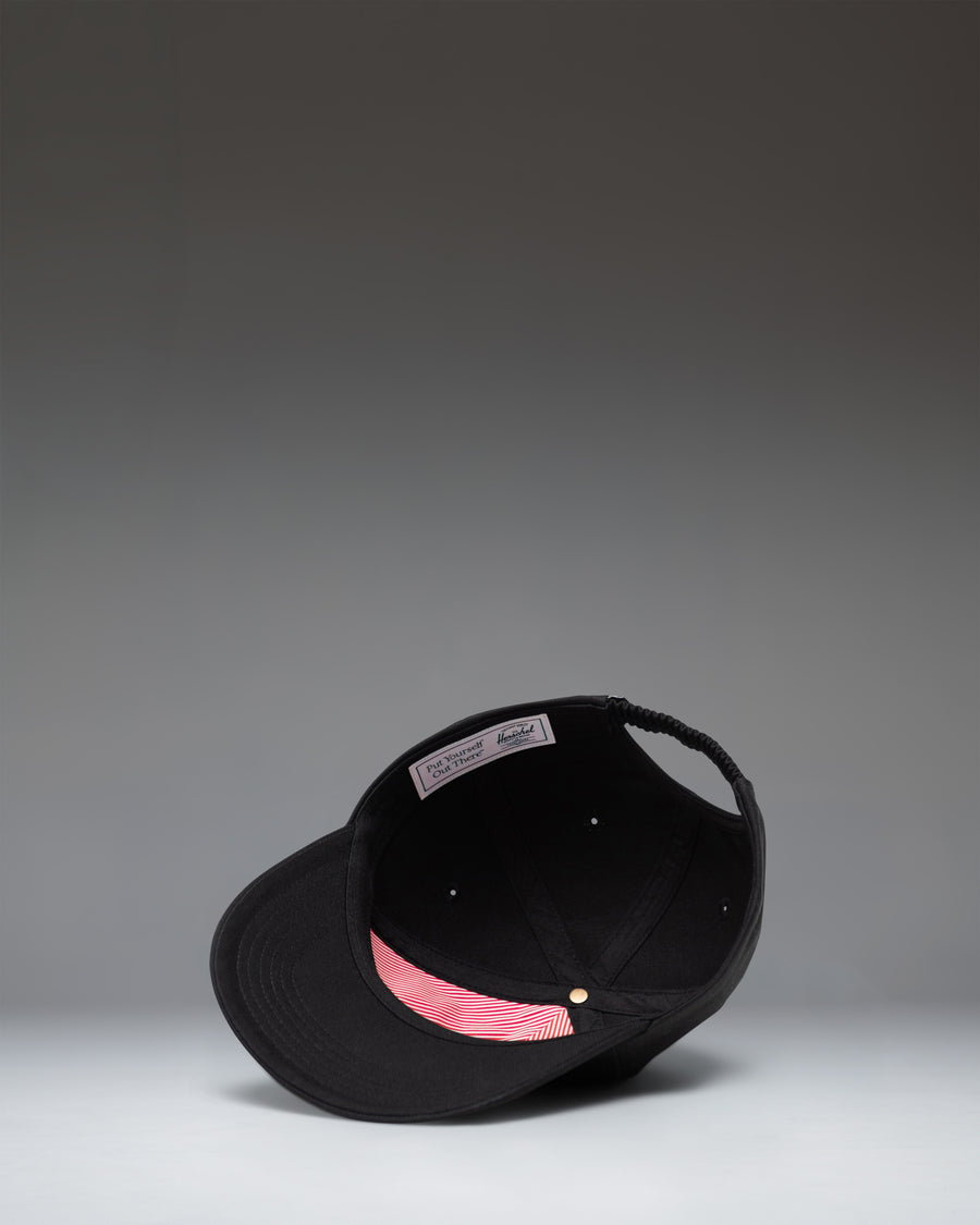 Black Herschel Supply Co. Sylas Kids Cap, a classic adjustable strapback hat for children.
