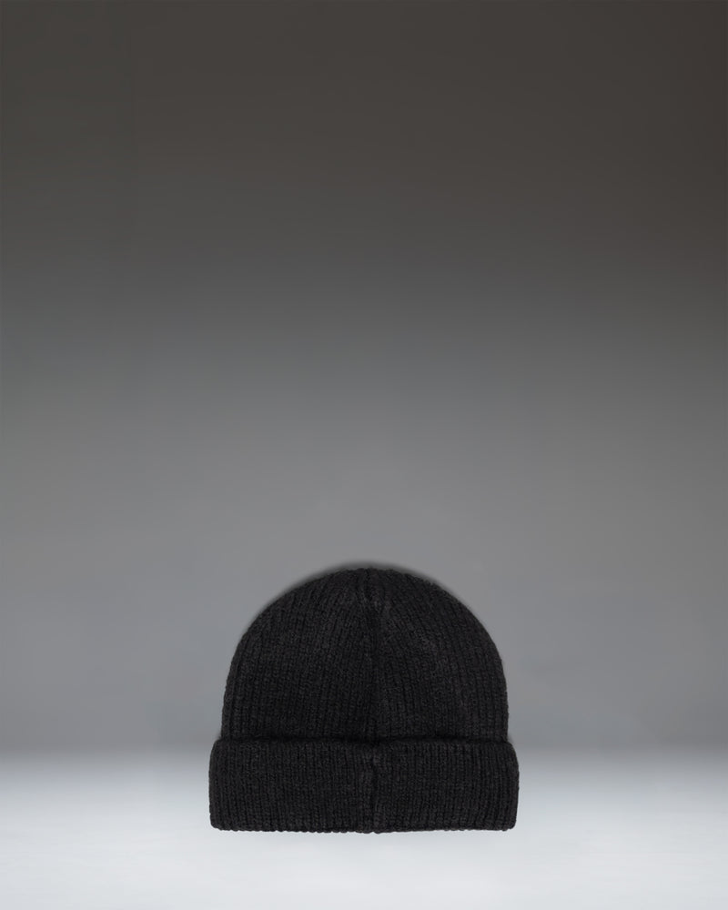 Black knit Herschel Supply Co. Super Soft Baby Beanie for ages 6-12 months.