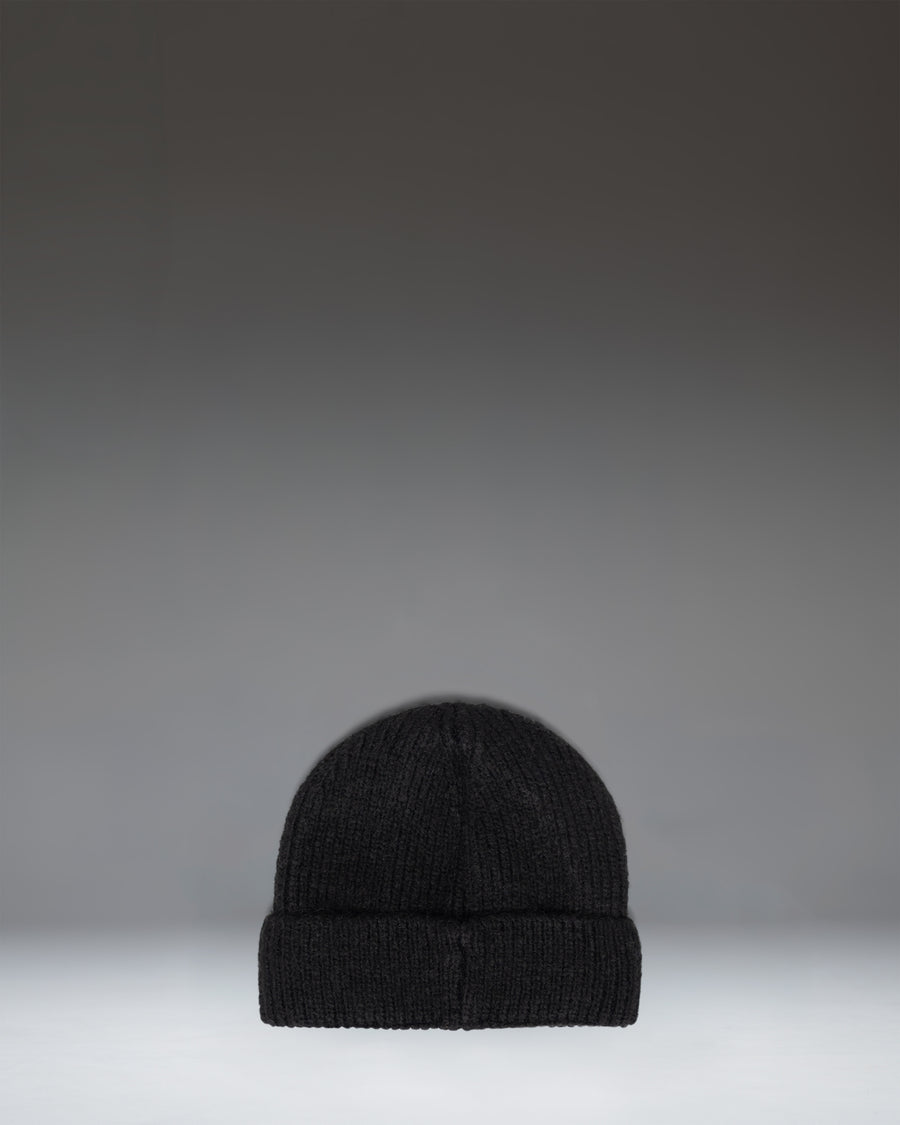 Black knit Herschel Supply Co. Super Soft Baby Beanie for ages 6-12 months.