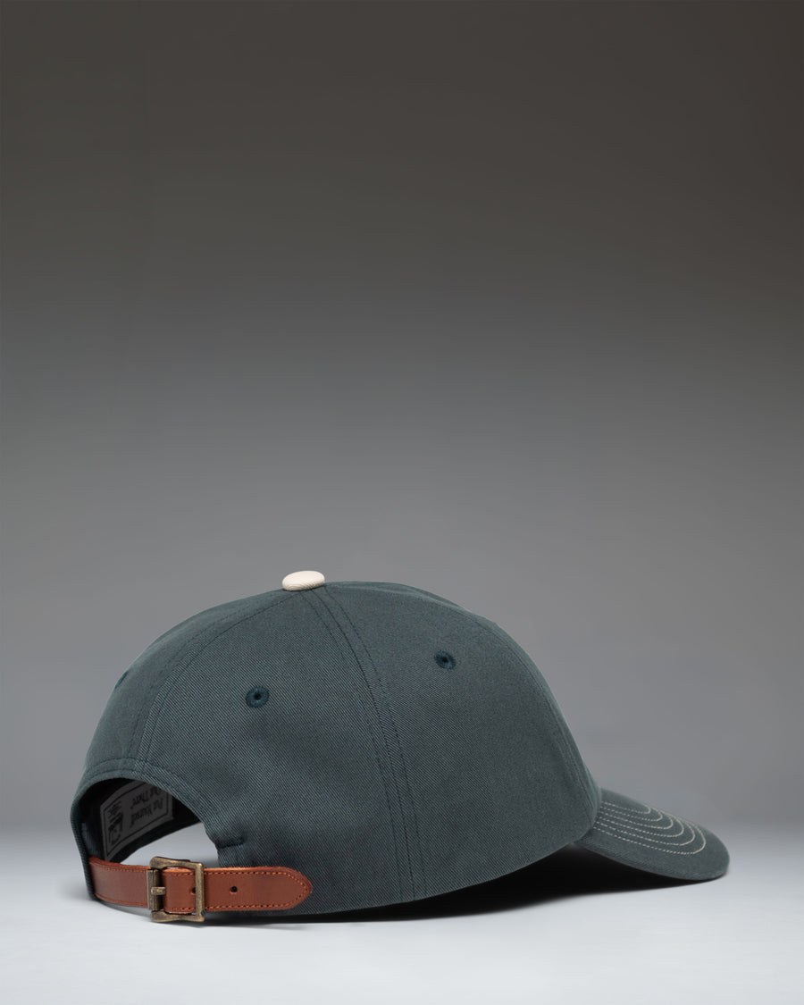 Herschel Supply Co. Sylas Premium Cap in Green Gables with vintage white contrast stitching, showing a front view of the structured baseball hat.