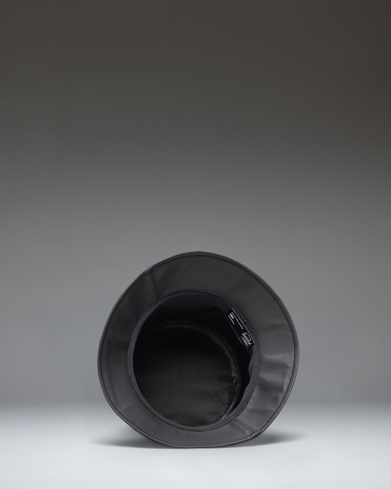 Size guide chart for Herschel Supply Co Norman Rain Bucket Hat in Black, showing measurements for all available sizes.