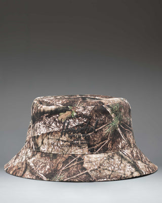 Herschel Supply Co. Realtree Norman Bucket Hat in Realtree APX Camo, showing the full hat with its camouflage pattern and stitched brim.
