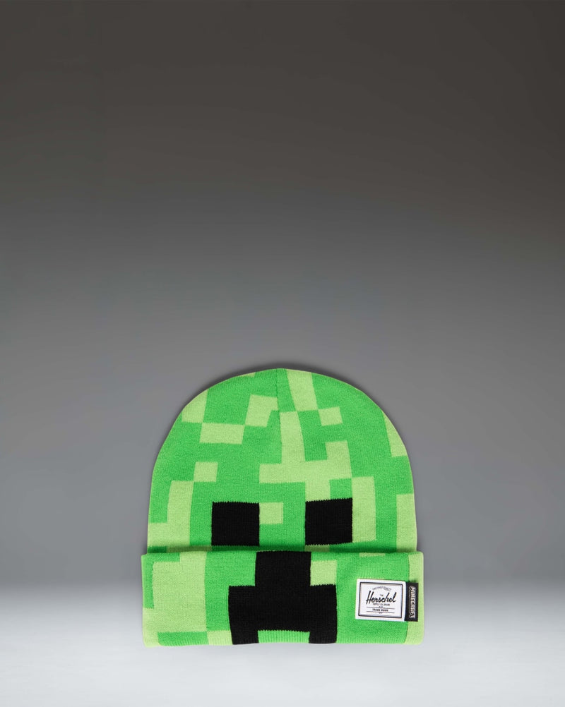 Herschel Supply Co. Minecraft Elmer Beanie in Creeper green, featuring a pixelated Creeper face knit design and a folded cuff.