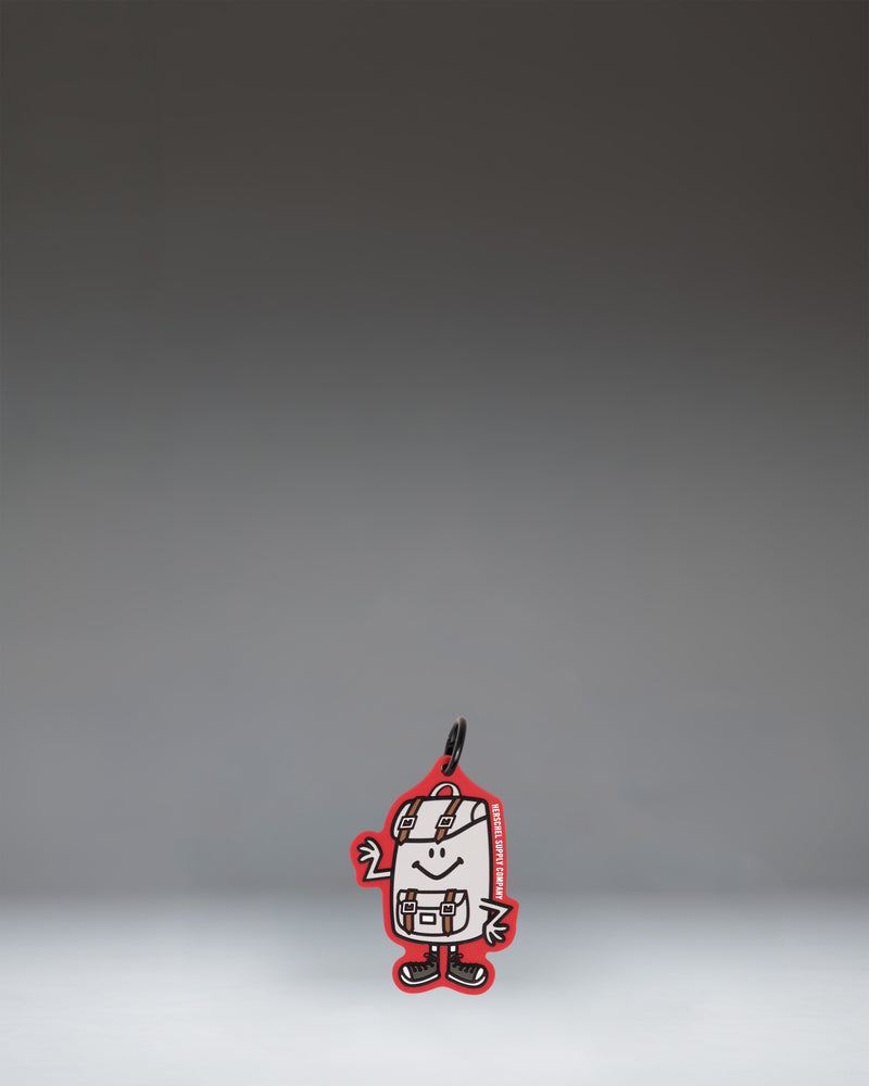 A miniature Herschel backpack bag charm in Tango Red featuring a front pocket, classic logo, and a snap hook for attaching to bags.