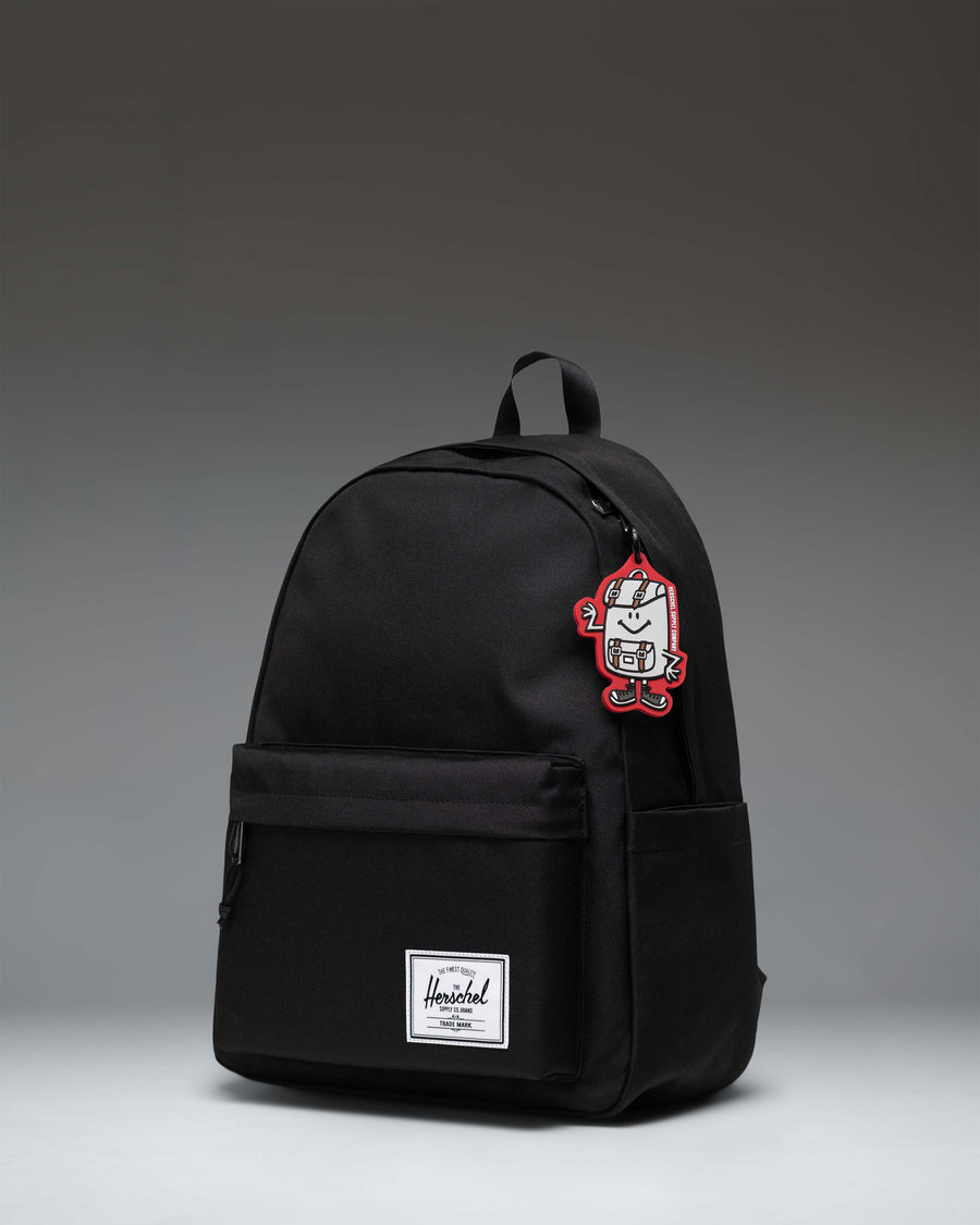 Herschel Supply Co. Sam Bag Charm Little Herschel in Tango Red, shown from the front.