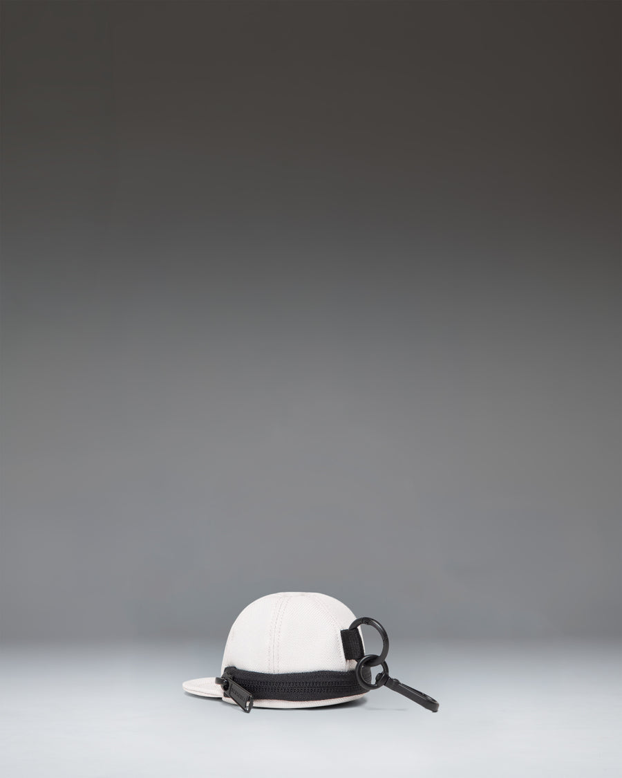 Herschel Supply Co. Sylas Classic Cap Bag Charm in Moonbeam. Miniature cap keychain accessory.