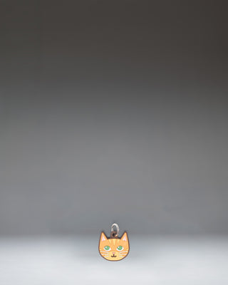 Herschel Cat Bag Charm in Orange Cat colorway, featuring a stylized orange cat design.
