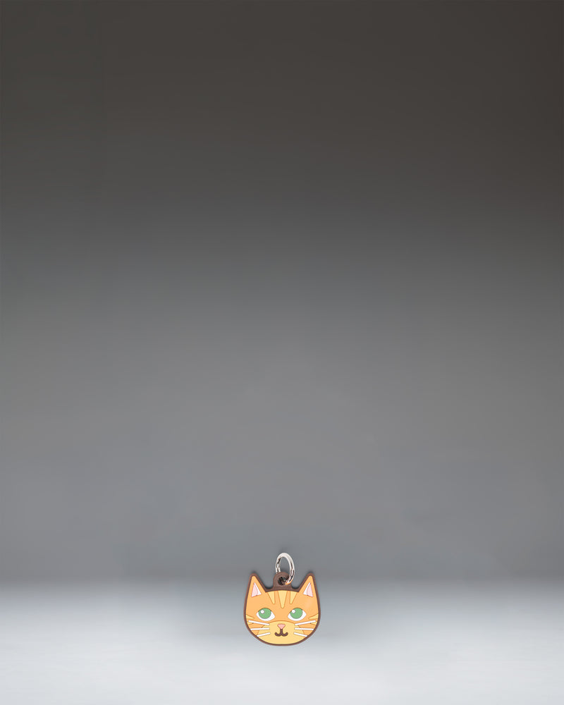 Herschel Cat Bag Charm in Orange Cat colorway, featuring a stylized orange cat design.