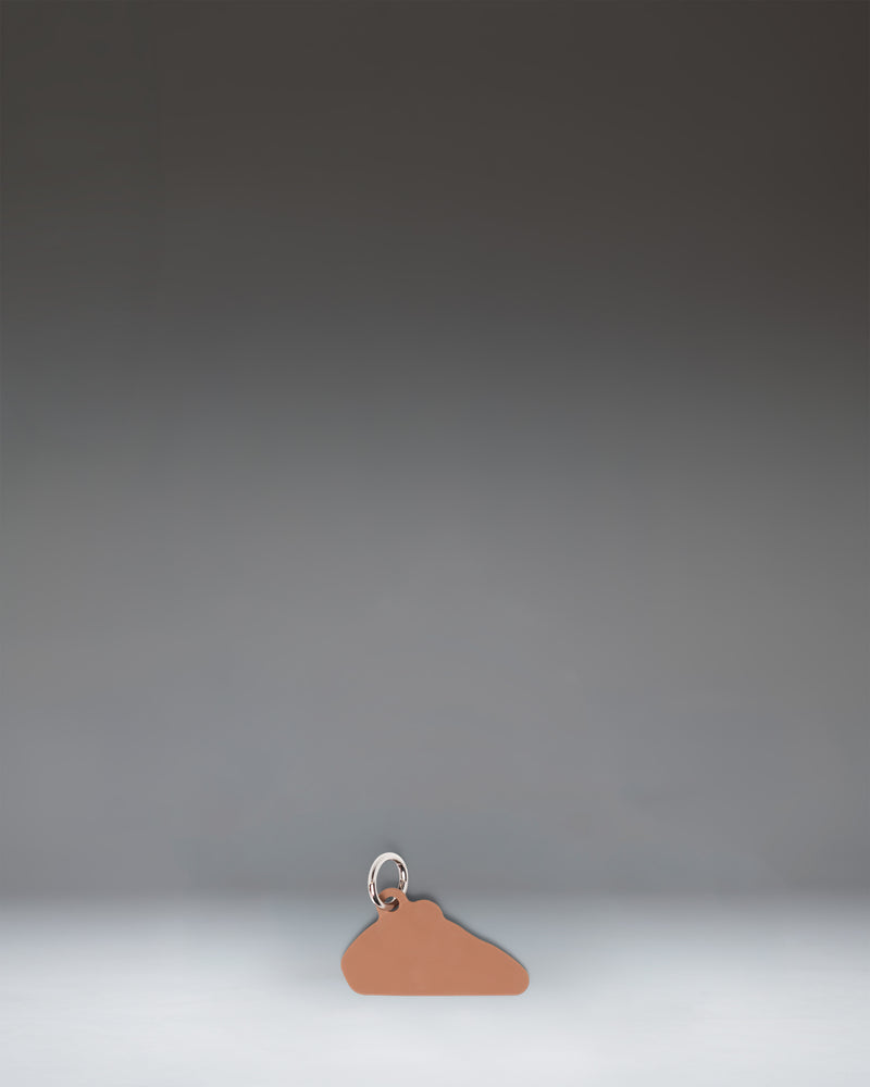 Herschel Pizza Bag Charm in Pepperoni colorway, showing a slice of pizza design.