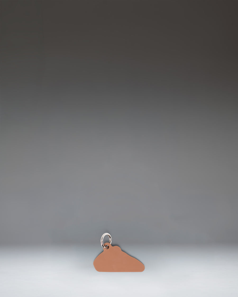 Herschel Pizza Bag Charm in Pepperoni colorway, showing a slice of pizza design.
