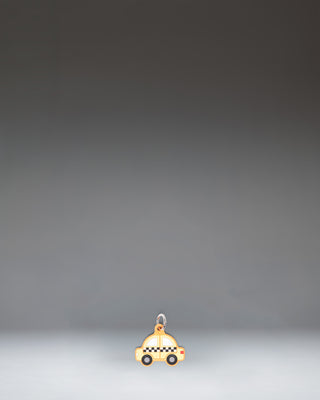 Herschel Taxi Bag Charm in Taxi, a yellow checker-cab-inspired miniature bag accessory with black and white checkered details.