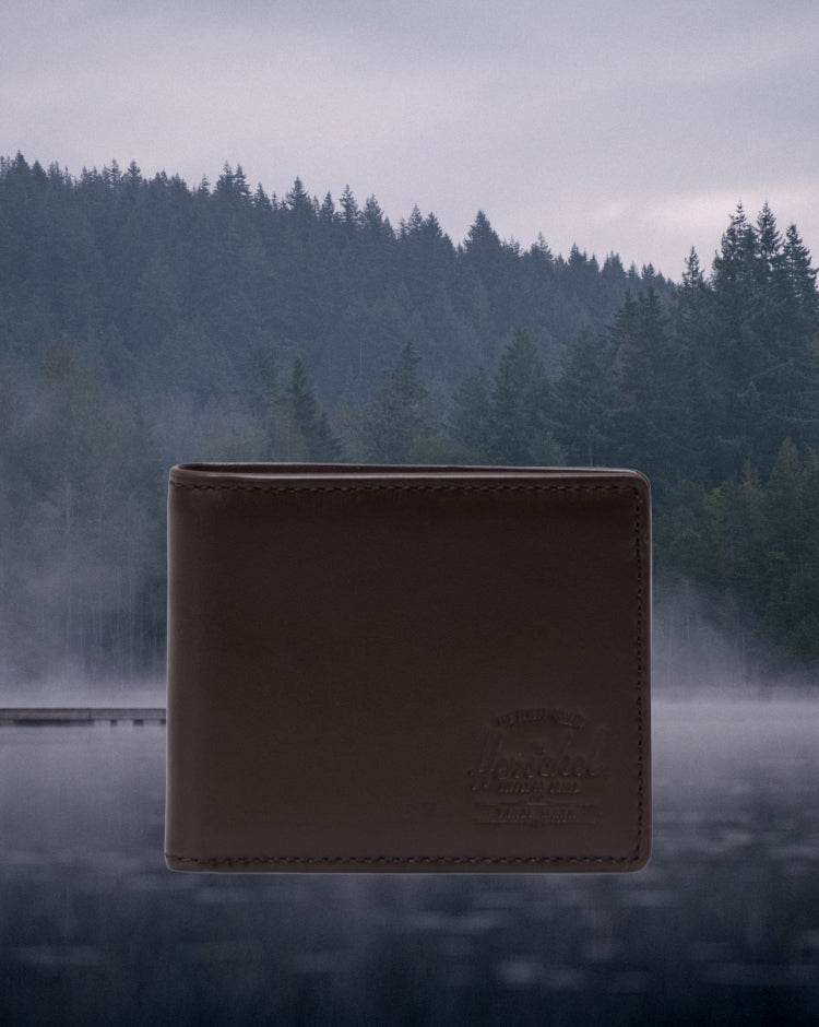 Herschel Supply Co. Hank Wallet Leather in brown, showing the classic bifold design.
