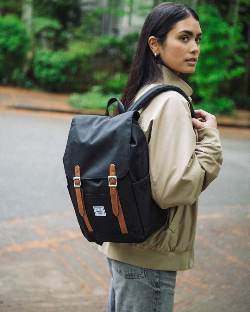 Herschel Retreat Small Backpack in black, shown from the front on a mobile display view.