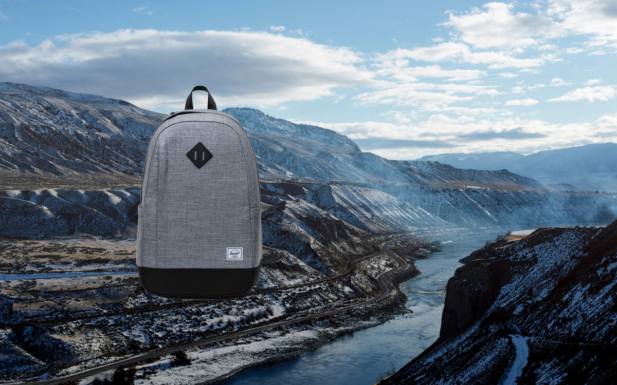Herschel Seymour Backpack in Raven Crosshatch grey shown from the front.