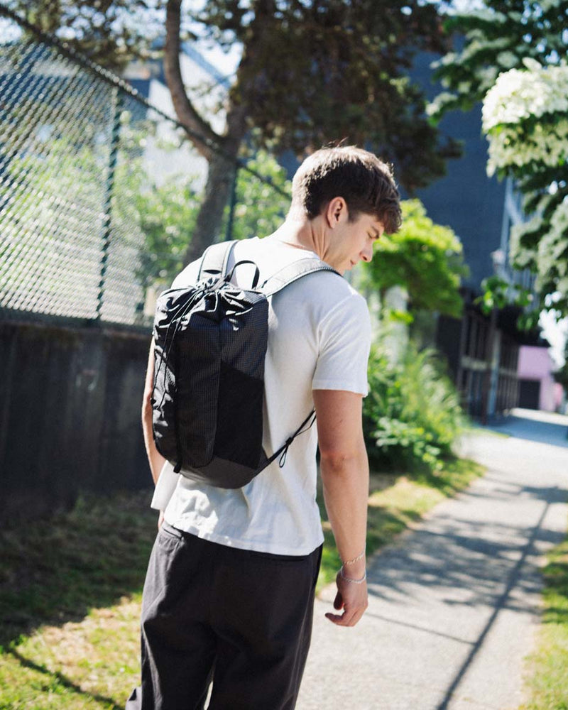 Herschel Supply Co. Ultralight Cinch Daypack 14 L in Black, shown as a lifestyle or product hero image.