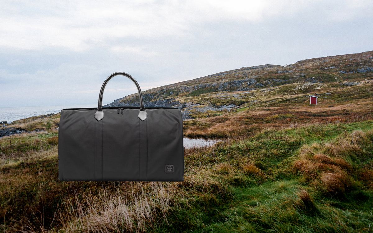 Black Herschel Novel Duffle bag showing the classic travel weekender design.