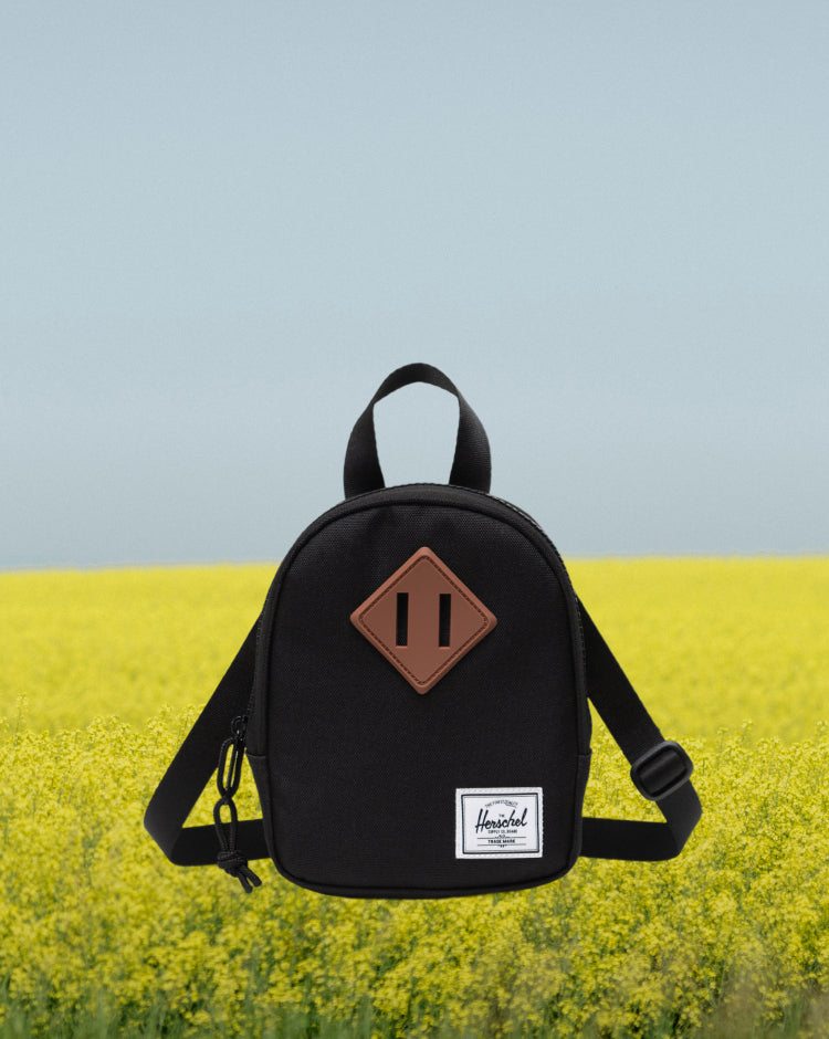 Black Herschel Heritage Crossbody Little Herschel bag.