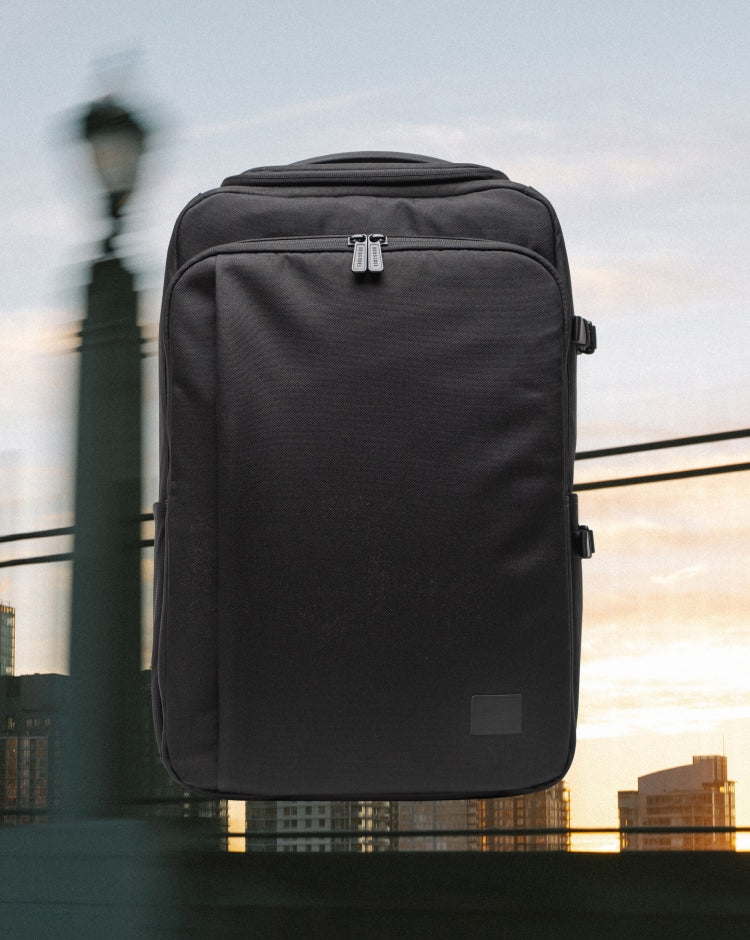 Herschel Supply Co. Kaslo Camera Bag Tech in black, showing a clean front view of the compact, durable tech organization bag.