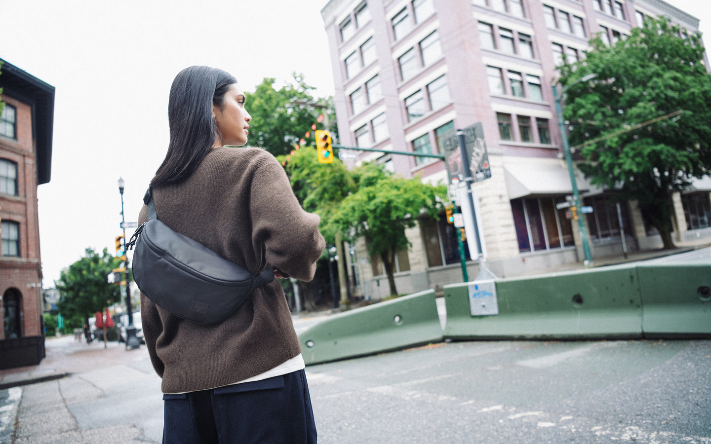 Herschel Supply Co. Kaine Hip Pack in black, a durable hands-free waist bag or crossbody pack.