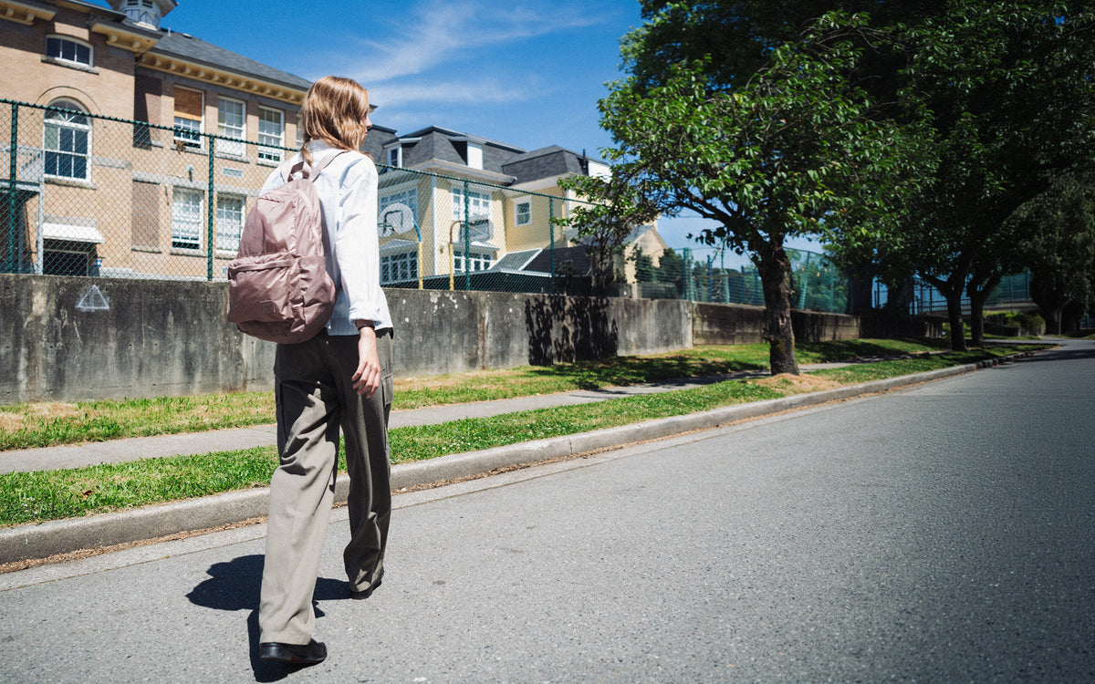 Herschel Supply Co. Rome Packable Backpack in Ash Rose Tonal displayed on a clean desktop background.